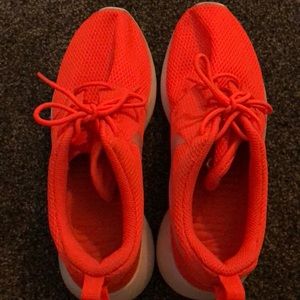 Bright orange nikes